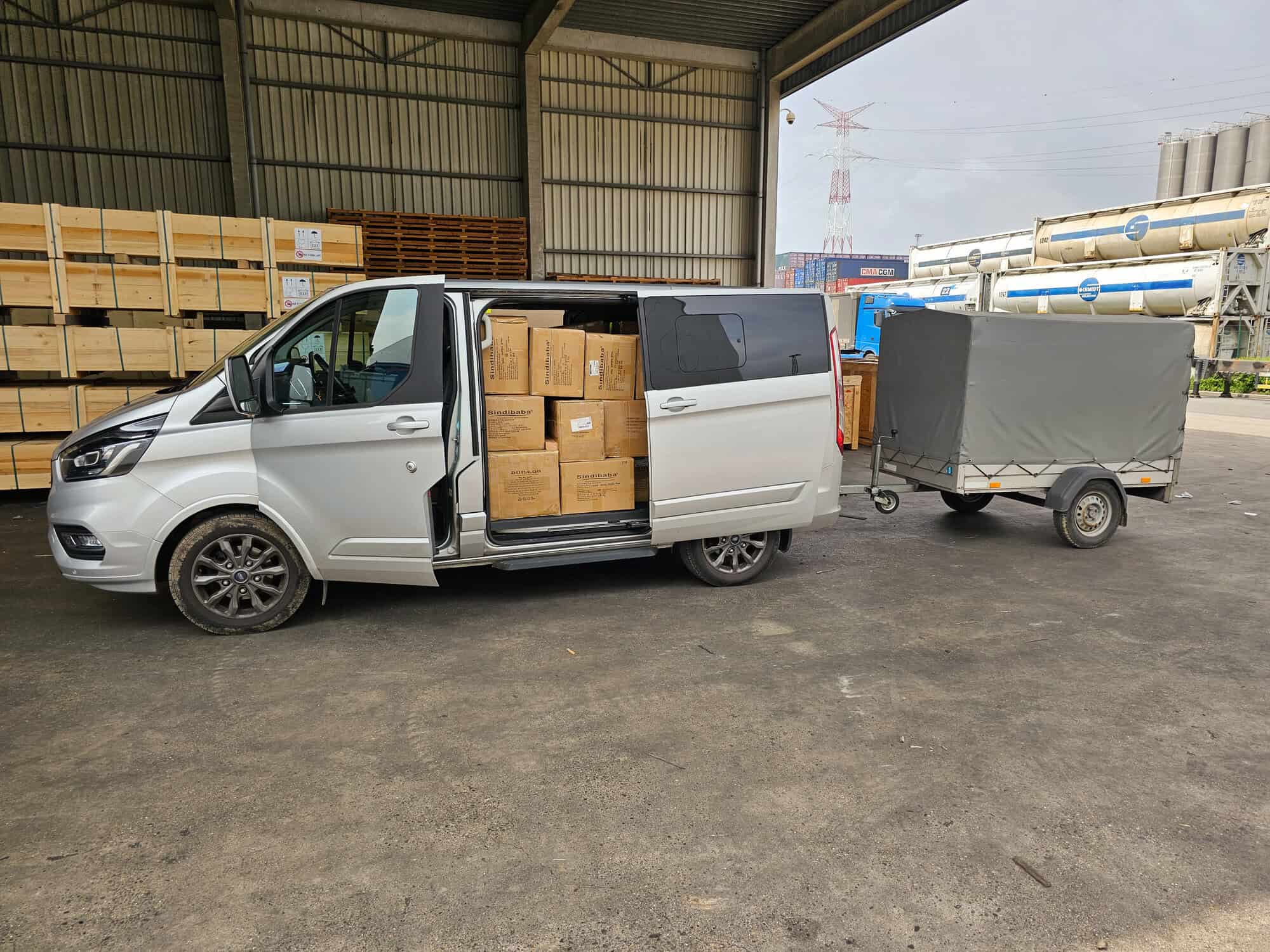 1-Step-To-Europe SUV and trailer picking up client's goods at the port in Antwerp, Belgium.